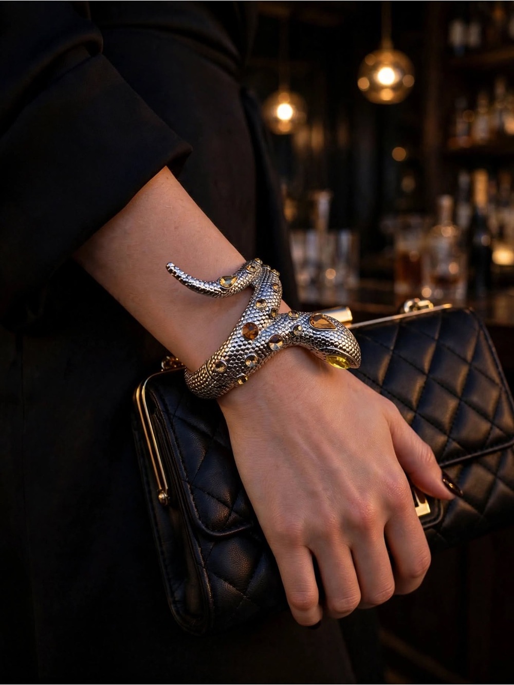 snake bracelet—yellow marquise eyes, amber teardrop